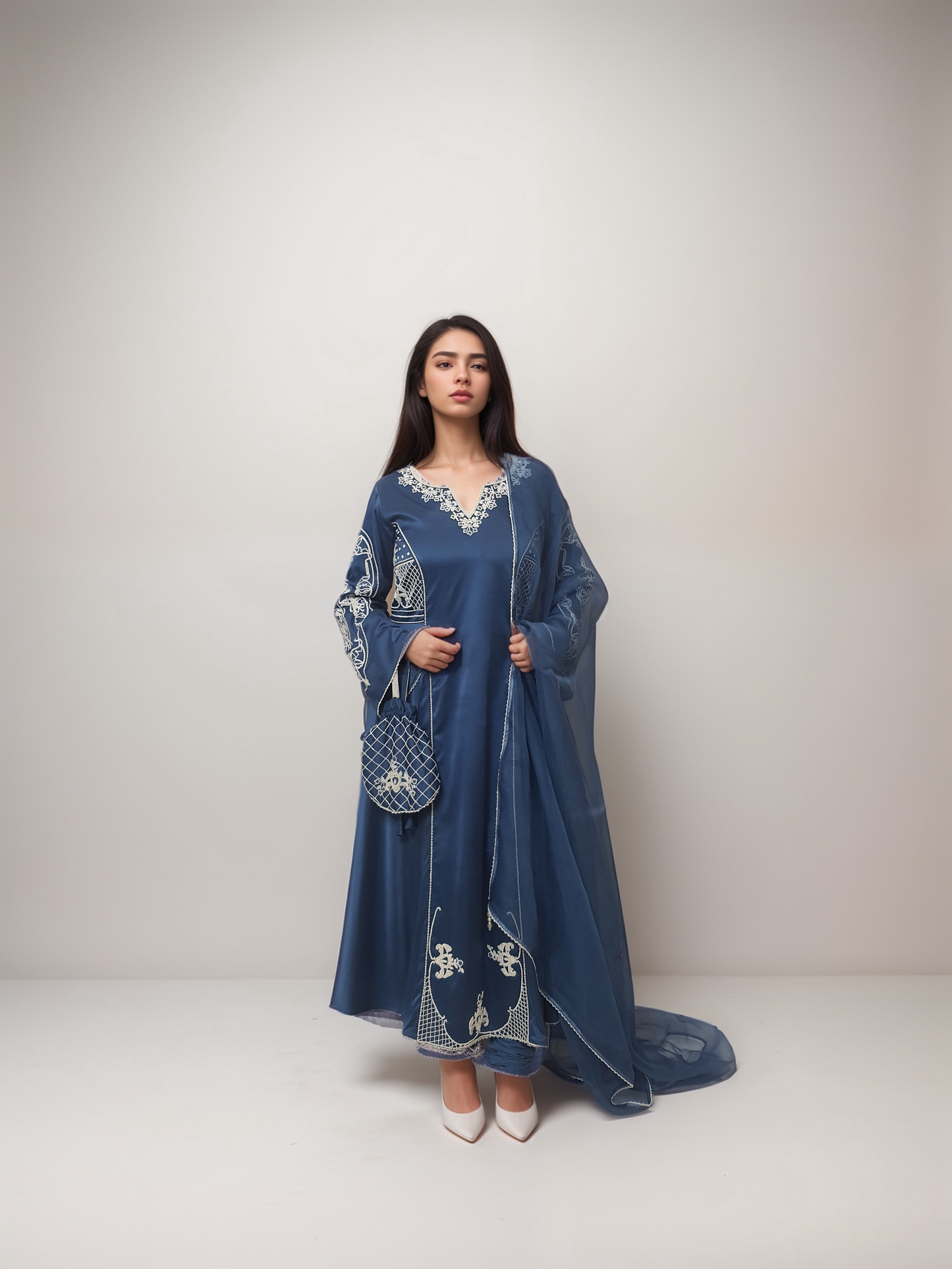 Blue Satin flared suit with hand embellished pearls and pottli